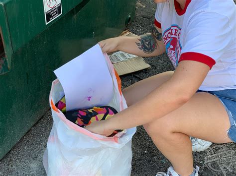 Woman Dumpster Diving