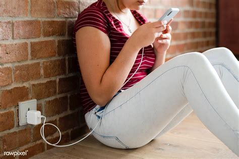 Using Phone While Charging Woman Hand Using Mobile Phone While