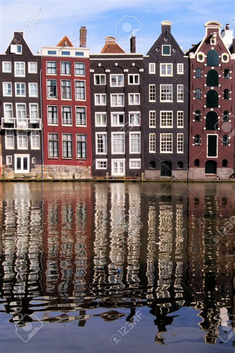 Canal Houses Of Amsterdam The Netherlands With Reflections Canal