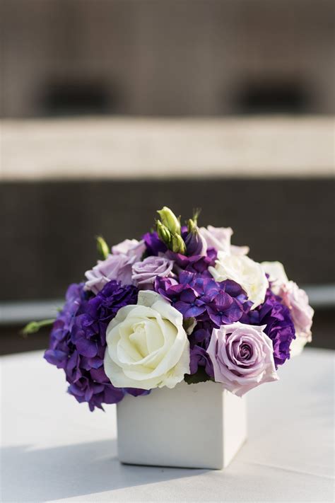 Purple and White Centerpieces