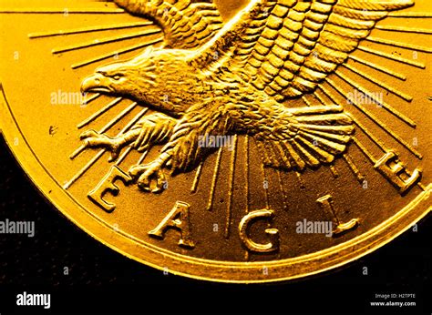 Pure gold coins and bars bullion Stock Photo - Alamy