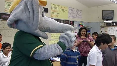 Oakland A's mascot helps deliver science kits to Global Family ...