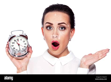 Closeup Portrait Of Shocked Woman With An Alarm Clock Isolated On White