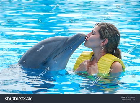 Happy Woman Kissing Dolphin In Pool Stock Photo 249894340 Shutterstock