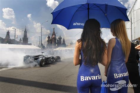 The charming Bavaria girls look on as Nico Rosberg starts | FORMULA 1 photos | Main gallery ...