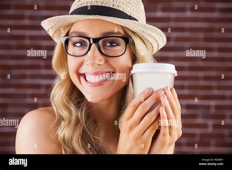 Gorgeous Smiling Blonde Hipster Holding Take Away Cup Stock Photo Alamy