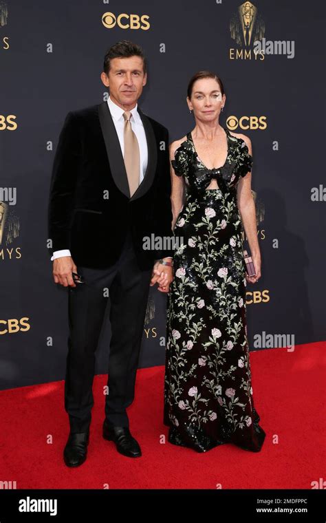 Jonathan Cake Left And Julianne Nicholson Arrive At The 73rd Emmy