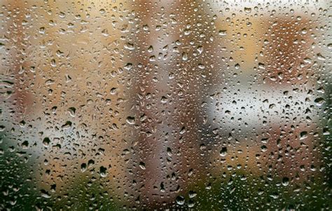 Premium Photo Water Drops On The Window Glass Rain Falls On The