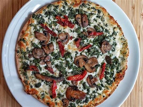 Mushroom And Sun Dried Tomato White Pizza