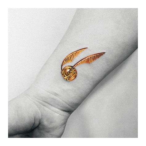 Top 100 Best Golden Snitch Tattoos For Women Harry Potter Design Ideas