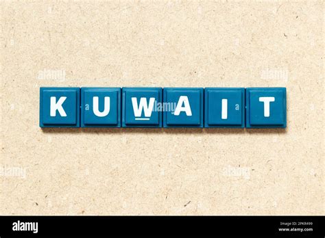 tile alphabet letter  word kuwait  wood background stock photo alamy