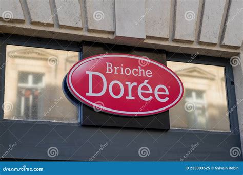 Brioche Doree Logo On The Famous French Bakery In The Street Editorial