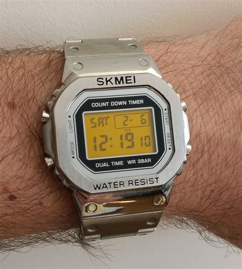 Skmei 1456 The Full Metal Body G Shock Homage Watch With Orange Screen