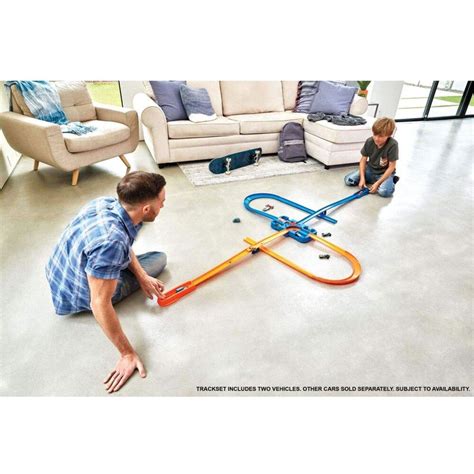 Unleash Your Inner Speed Demon Watching Cars Zip Down The Tracks With The Hot Wheels Toy Car
