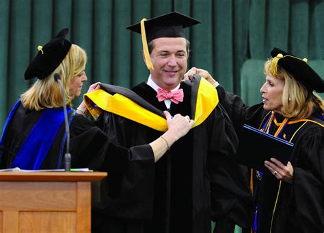 Photo: Commencement speaker – Oswego Alumni Magazine