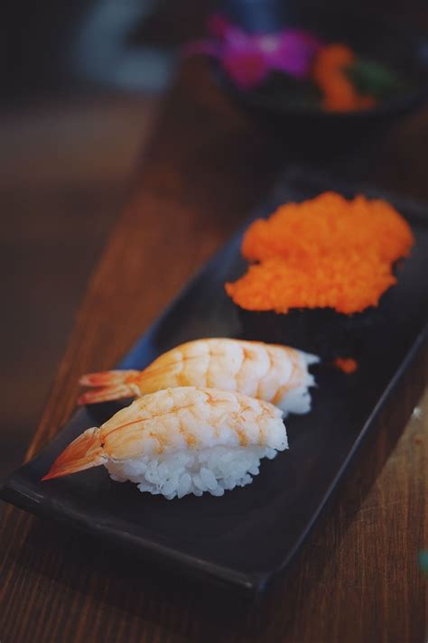 Shallow Focus Photo Shrimp Sushi Sushi Food Shrimp Rice Plate