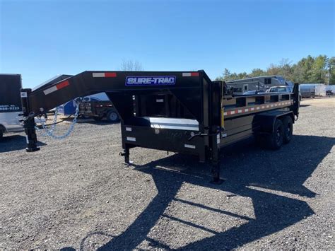 2023 Sure Trac 7x16 Powder Coated 14k Lowpro Gooseneck Dump Trailer Wramps And Tarp Trailer Trader