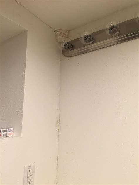 damage - Water Leaking From Upstairs Restroom Down to Basement Restroom