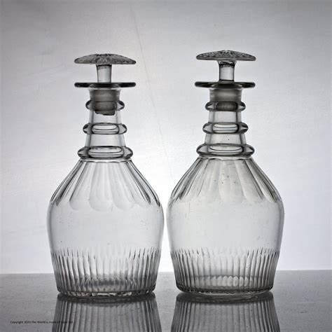 Pair Of Georgian Mouth Blown Prussian Shaped Spirit Decanters The World Is Made Of Glass