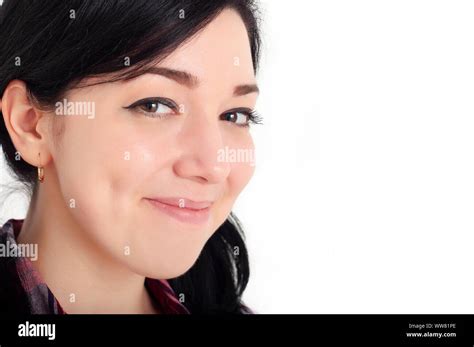 A Young Joyful Beautiful Brunette Girl With Cute Dimples On Her Cheeks