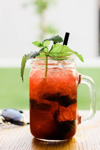 Premium Photo Vertical Selective Focus Shot Of Strawberry Cocktail