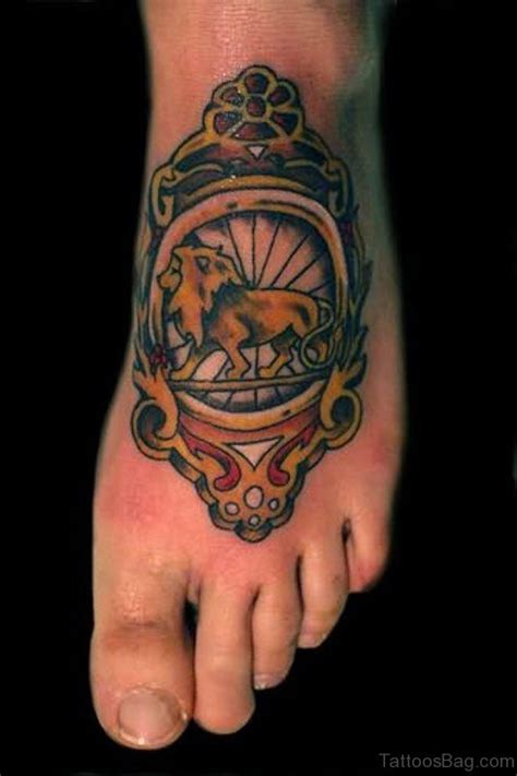 28 Incredible Lion Tattoos On Foot Tattoo Designs