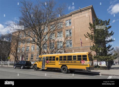 School Bus Parked Outside A New York City Public Elementary School In