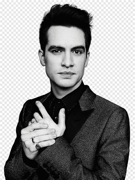 Tons de cinza de homem vestindo paletó preto e cinza Brendon Urie