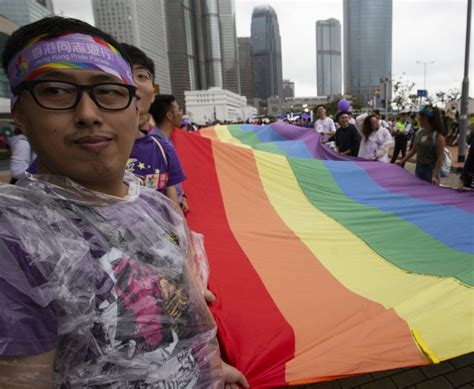 Hong Kong Court Rules Gay Couple Eligible For Spousal Benefits