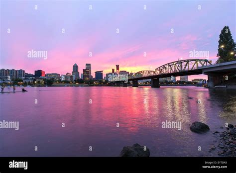 Pink Sunset Over Portland Oregon Downtown Waterfront City Skyline Along