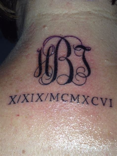 Tattoo With Initials And Wedding Date In Roman Numerals