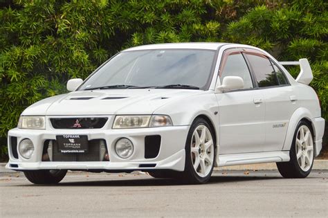 Mitsubishi Lancer Toprank Importers