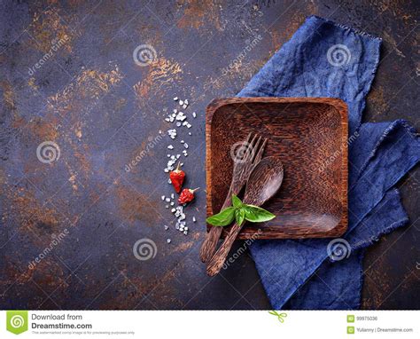 Empty Wooden Plate Cutlery Salt Pepper And Basil Stock Photo Image