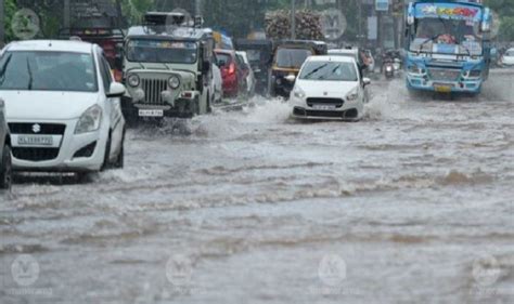 Heavy Rains Lash Kerala Imd Issues Red Alert In 5 Districts Orange