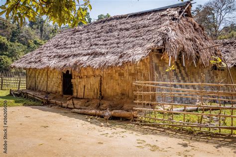 Indian Village House Made Of Dry Coconut Leaf With Thatched Roof At