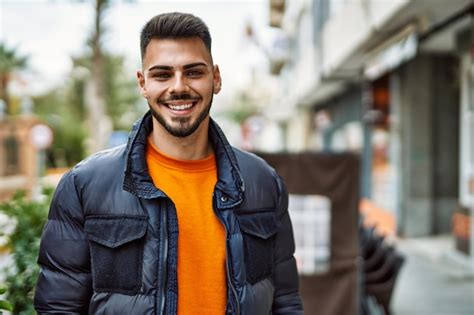 Premium Photo Handsome Hispanic Man With Beard Smiling Happy And