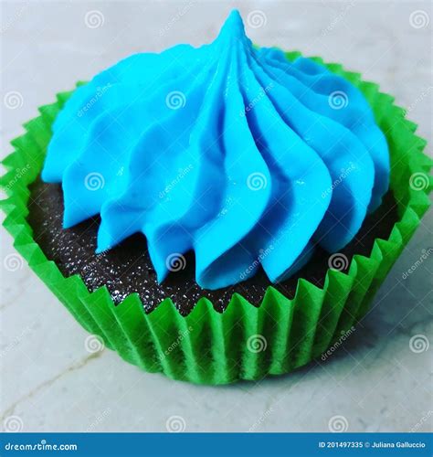 Decadent Chocolate Cupcake With A Delightful Blue Frosting Stock Image