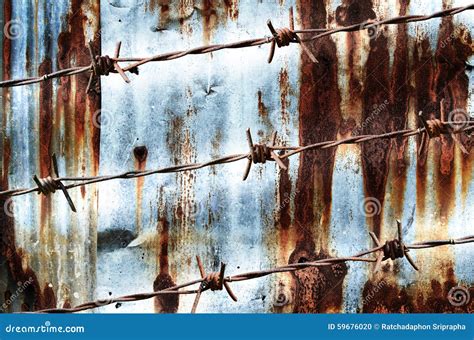 Rusty Barbed Wire Design With On Rust Wall Stock Photo Image Of