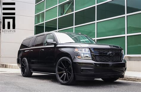 All Black Chevy Suburban on Custom Wheels by Exclusive Motoring — CARiD ...