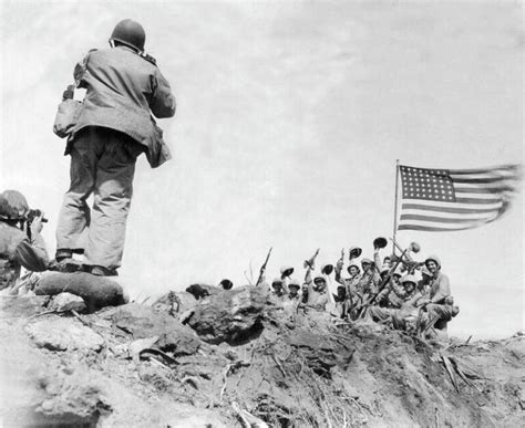 Raising The Flag On Iwo Jima The Story Behind Ww S Most Iconic Photo