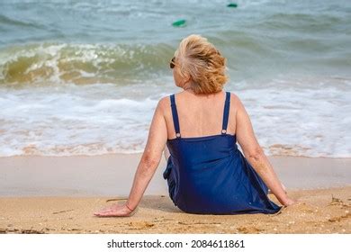 Happy Mature Woman Enjoying On Sea Stock Photo 2084611861 Shutterstock