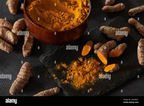 turmeric roots and powder. healthy spice concept Stock Photo - Alamy