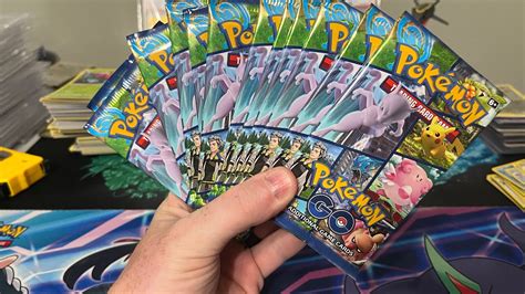 Opening Pok Mon Go Packs In Search Of The Alt Art Mewtwo V Pok Mon Card