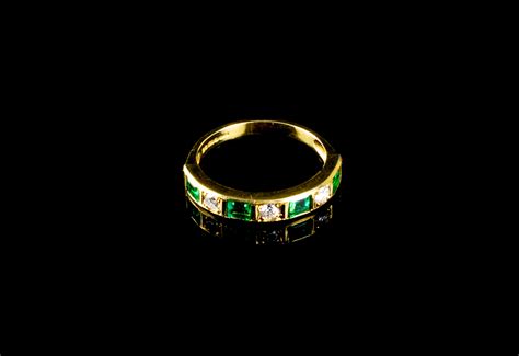 18ct Gold Emerald And Diamond Seven Stone Half Eternity Ring Goodwins