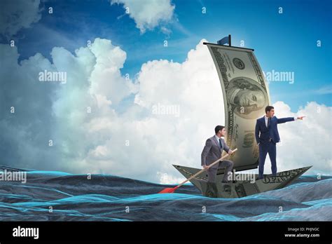 Business Partnership With Businessmen Sailing On Dollar Boat Stock