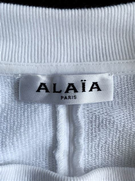 ALAIA LOGO CROPPED SWEATER on Carousell