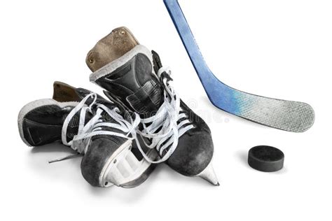 Pair of Hockey Skates with Hockey Stick and Puck Stock Image - Image of action, bootlace: 108455047