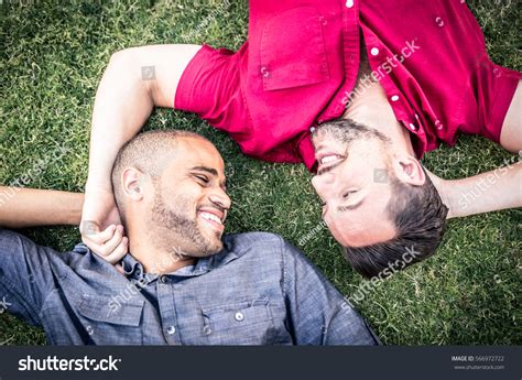Happy Gay Couple Lying Down On Stock Photo Edit Now 566972722