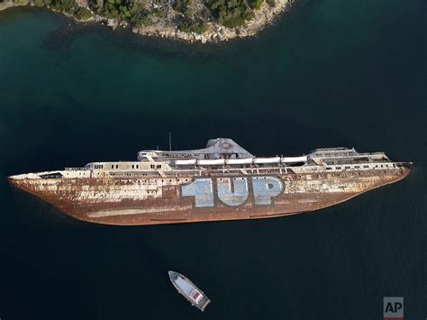 Greece Hauls Abandoned Half Sunken Ships Out Of The Sea Ap Images