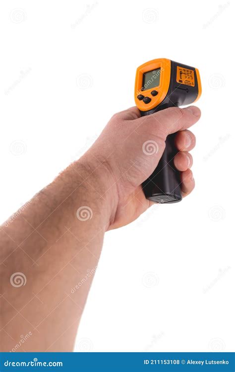 A Man Holds A Yellow Black Pyrometer A Device For Non Contact